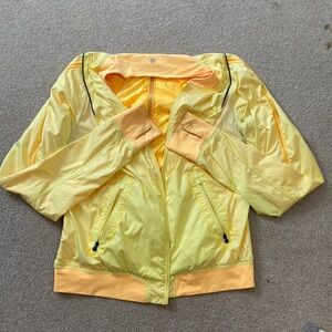 Yellow Lululemon jacket size 12, like new but minimal staining on sleeve cuffs